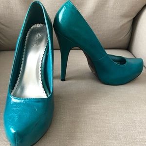 Teal colored high heels